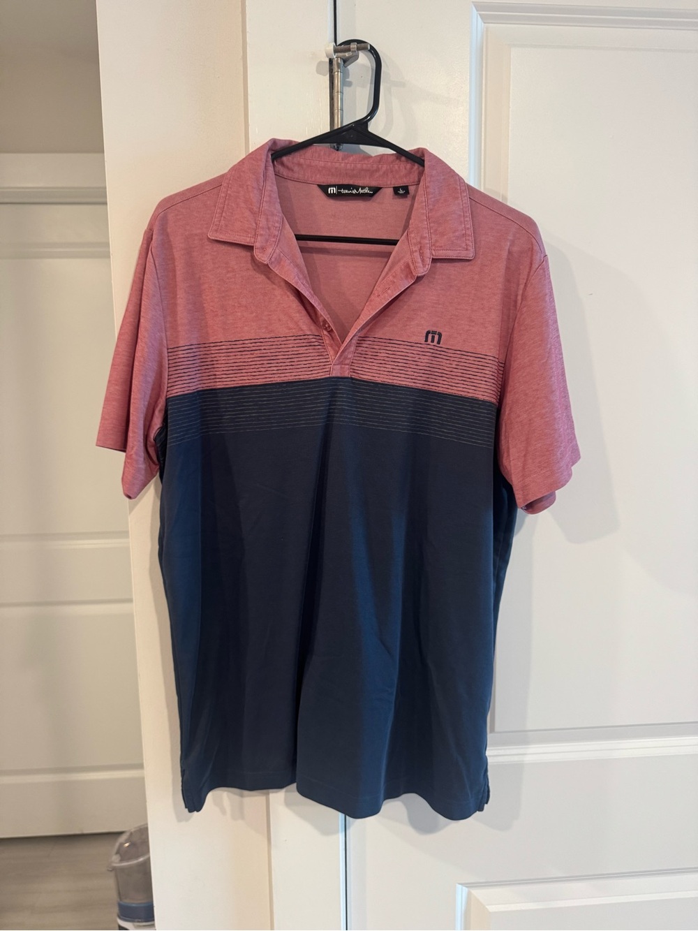 Travis Mathew Pink and Navy Striped Chest Polo